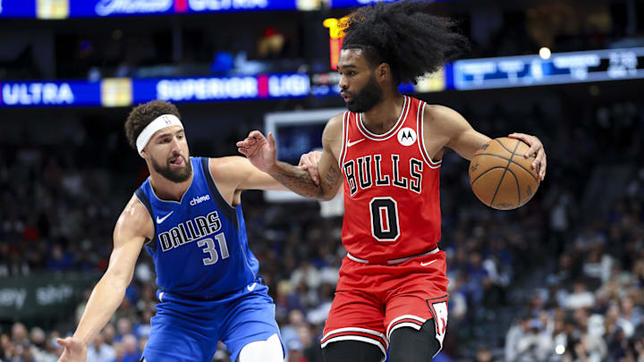 Nov 6, 2024; Dallas, Texas, USA; Chicago Bulls guard Coby White (0) controls the ball as Dallas Mavericks guard Klay Thompson (31) defends during the first quarter at American Airlines Center. Mandatory Credit: Kevin Jairaj-Imagn Images Nov 6, 2024; Dallas, Texas, USA; Chicago Bulls guard Coby White (0) controls the ball as Dallas Mavericks guard Klay Thompson (31) defends during the first quarter at American Airlines Center. Mandatory Credit: Kevin Jairaj-Imagn Images