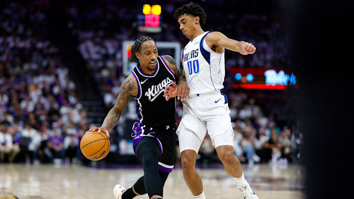 Apr 16, 2025; Sacramento, California, USA; Sacramento Kings forward DeMar DeRozan (10) dribbles the ball against Dallas Mavericks guard Max Christie (00) during the fourth quarter at Golden 1 Center. Mandatory Credit: Sergio Estrada-Imagn Images Apr 16, 2025; Sacramento, California, USA; Sacramento Kings forward DeMar DeRozan (10) dribbles the ball against Dallas Mavericks guard Max Christie (00) during the fourth quarter at Golden 1 Center. Mandatory Credit: Sergio Estrada-Imagn Images