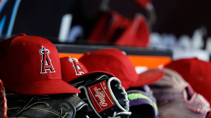 Aug 8, 2026; Miami, Florida, USA; Los Angeles Angels hats and gloves sit in the dugout against the Miami Marlins during the fifth inning at loanDepot Park. Mandatory Credit: Rhona Wise-Imagn Images Aug 8, 2026; Miami, Florida, USA; Los Angeles Angels hats and gloves sit in the dugout against the Miami Marlins during the fifth inning at loanDepot Park. Mandatory Credit: Rhona Wise-Imagn Images