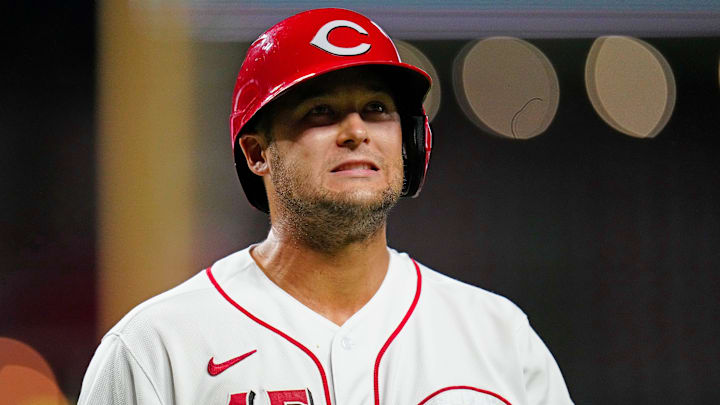 Cincinnati Reds center fielder Nick Senzel (15) walks back to the dugout.