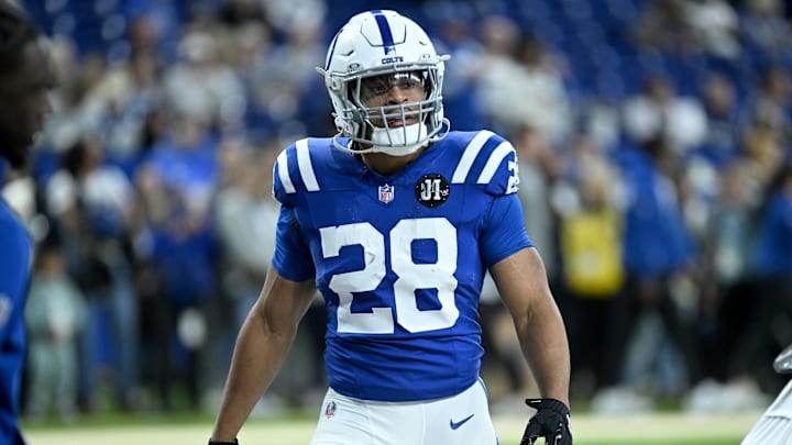 Nov 30, 2025; Indianapolis, Indiana, USA; Indianapolis Colts running back Jonathan Taylor (28) warms up before a game against the Houston Texans at Lucas Oil Stadium. 
