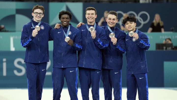 Jul 29, 2024; Paris, France; (From left to right) Stephen Nedoroscik, Frederick Richard, Brody Malone, Paul Juda, and Asher Hong hold their bronze medals after the men’s team final during the Paris 2024 Olympic Summer Games at Bercy Arena. Mandatory Credit: Kyle Terada-USA TODAY Sports Jul 29, 2024; Paris, France; (From left to right) Stephen Nedoroscik, Frederick Richard, Brody Malone, Paul Juda, and Asher Hong hold their bronze medals after the men’s team final during the Paris 2024 Olympic Summer Games at Bercy Arena. Mandatory Credit: Kyle Terada-USA TODAY Sports