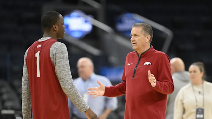 Mar 26, 2025; San Francisco, CA, USA; Arkansas Razorbacks head coach John Calipari (right) talks to guard Johnell Davis (1) during NCAA Tournament West Regional Practice at Chase Center. Mandatory Credit: Eakin Howard-Imagn Images