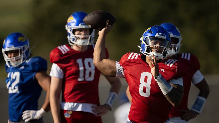 Kansas redshirt sophomore quarterback Isaiah Marshall (8) passes the ball during spring football practice Thursday, Mar. 26, 2026 in Lawrence, Kansas. Kansas redshirt sophomore quarterback Isaiah Marshall (8) passes the ball during spring football practice Thursday, Mar. 26, 2026 in Lawrence, Kansas.