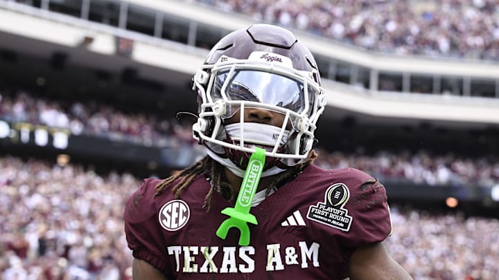 Dec 20, 2025; College Station, TX, USA; Texas A&M Aggies wide receiver Mario Craver (1) celebrates a catch against the Texas A&M Aggies during first half of the first round game of the CFP National Playoff at Kyle Field. Mandatory Credit: Jerome Miron-Imagn Images