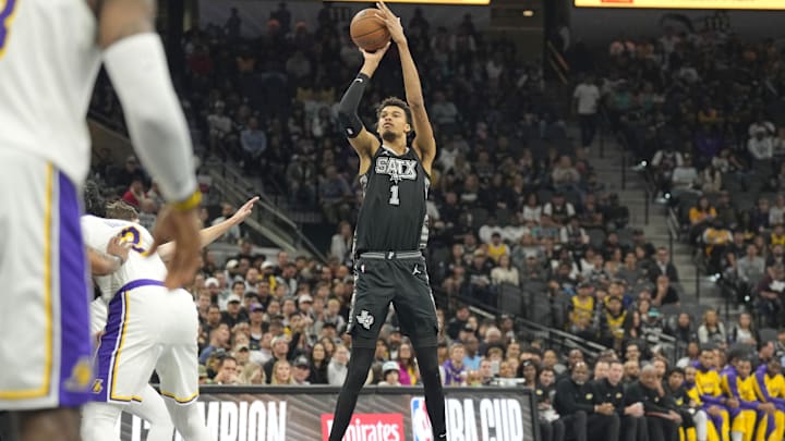 Nov 15, 2024; San Antonio, Texas, USA; San Antonio Spurs center Victor Wembanyama (1) shoots a three point shot during the first half against the Los Angeles Lakers at Frost Bank Center. Mandatory Credit: Scott Wachter-Imagn Images