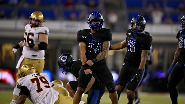 Nov 16, 2024; Dallas, Texas, USA; SMU Mustangs linebacker Ahmad Walker (34) celebrates during the game between the SMU Mustangs and the Boston College Eagles at Gerald J. Ford Stadium. Mandatory Credit: Jerome Miron-Imagn Images