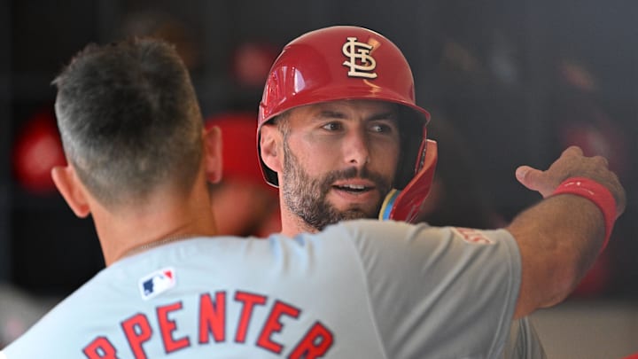 May 12, 2024; Milwaukee, Wisconsin, USA; St. Louis Cardinals first base Paul Goldschmidt (46) is congratulated by St. Louis Cardinals designated hitter Matt Carpenter (13) after hitting a home run against the Milwaukee Brewers in the fifth inning at American Family Field. Mandatory Credit: Michael McLoone-Imagn Images