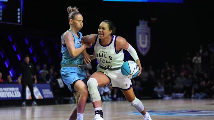 Jan 17, 2025; Miami, FL, USA; Napheesa Collier (24) of the Lunar Owls drives toward the basket as Courtney Vandersloot (25) of the Mist defends during the first half of the Unrivaled women’s professional 3v3 basketball league at Wayfair Arena. Mandatory Credit: Jim Rassol-Imagn Images
