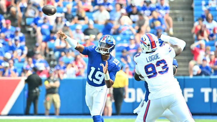 Aug 9, 2025; Orchard Park, New York, USA; New York Giants quarterback Jameis Winston (19) throws a pass in the third quarter as Buffalo Bills defensive tackle Zion Logue (93) rushes