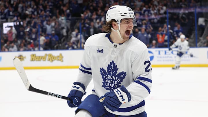 Apr 9, 2025; Tampa, Florida, USA; Toronto Maple Leafs left wing Matthew Knies (23) celebrates after scoring the winning goal against the Tampa Bay Lightning during overtime at Amalie Arena. Mandatory Credit: Kim Klement Neitzel-Imagn Images