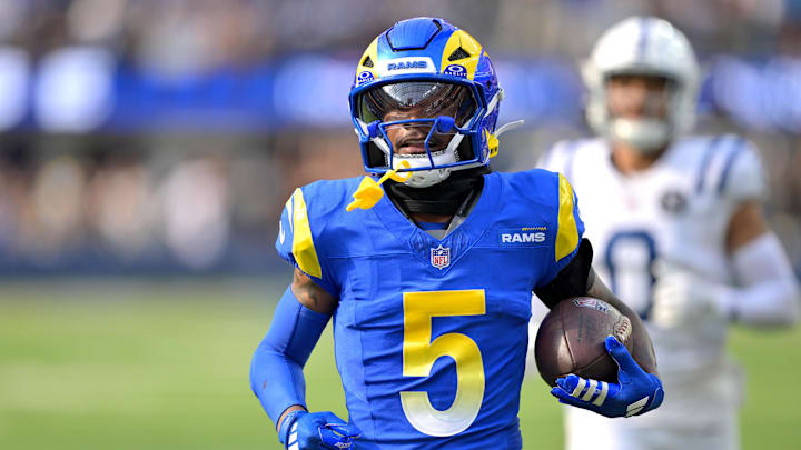Sep 28, 2025; Inglewood, California, USA; Los Angeles Rams wide receiver Tutu Atwell (5) runs for a touchdown on an 88 yard pass play in the fourth quarter against the Indianapolis Colts at SoFi Stadium. Mandatory Credit: Jayne Kamin-Oncea-Imagn Images