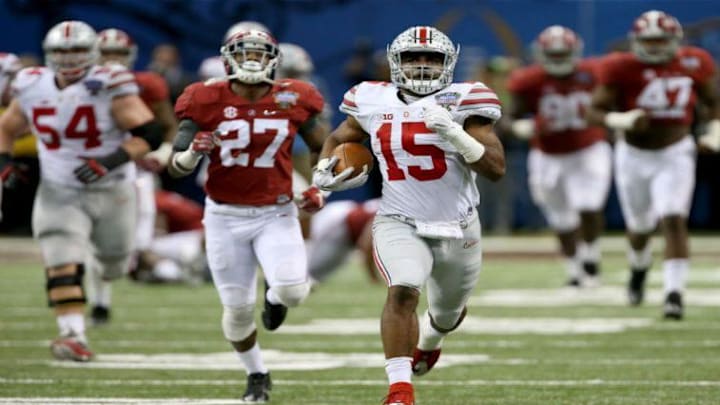 Ohio State's Ezekiel Elliott breaks away from Alabama defenders on an 85-yard touchdown jaunt in the 2015 Sugar Bowl.

Main art