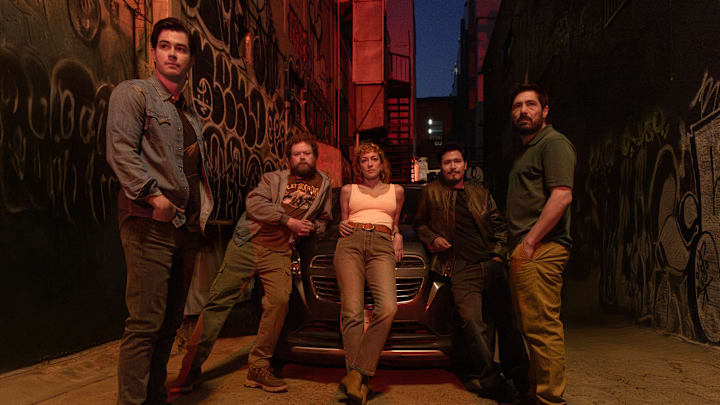 Gringo Hunters S1. (L to R) Manuel Masalva as Beto, Andrew Leland as El Archie, Mayra Hermosillo as Gloria, Harold Torres as Nico, Héctor Kotsifakis as Cri in Gringo Hunters S1. Cr. Carla Danieli / Netflix ©2024