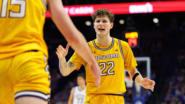 Nov 19, 2024; Lexington, Kentucky, USA; Lipscomb Bisons guard Joe Anderson (22) celebrates with forward Dylan Faulkner (15) during the second half against the Kentucky Wildcats at Rupp Arena at Central Bank Center. Mandatory Credit: Jordan Prather-Imagn Images