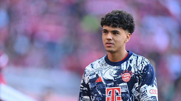 Adam Aznou warming up before a Bundesliga game last season