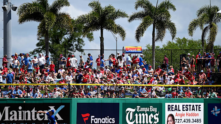 Mar 24, 2024: Fans look on Toronto Blue Jays starting pitcher Chris Bassitt (40) warms up before the start of the spring training game against the Philadelphia Phillies at BayCare Ballpark.