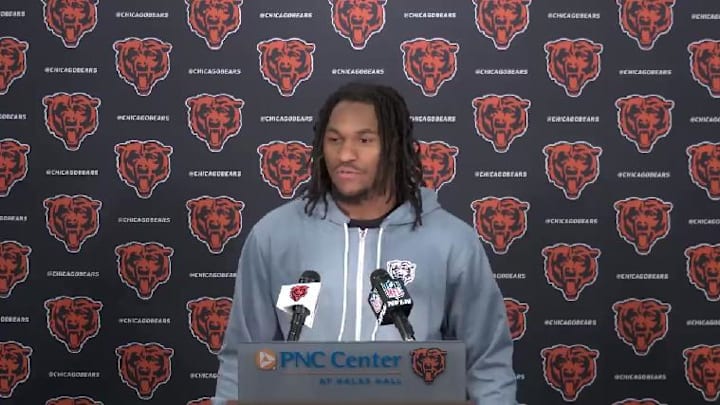 Luther Burden III addresses media at Halas Hall.