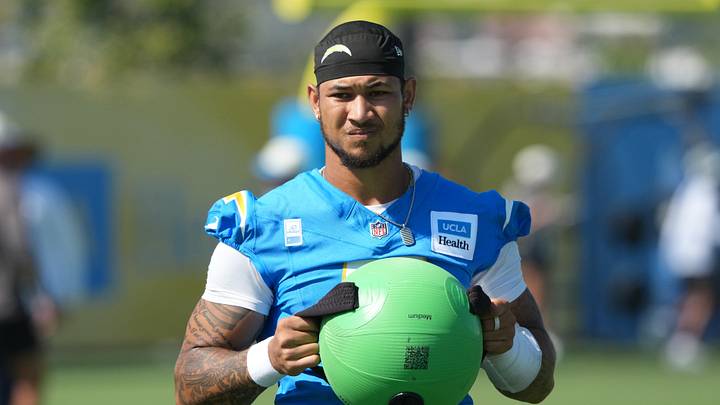 Jul 31, 2026; El Segundo, CA, USA; Los Angeles Chargers quarterback Trey Lance (5) holds a KHAOS Water Ball during training camp at The Bolt. Mandatory Credit: Kirby Lee-Imagn Images