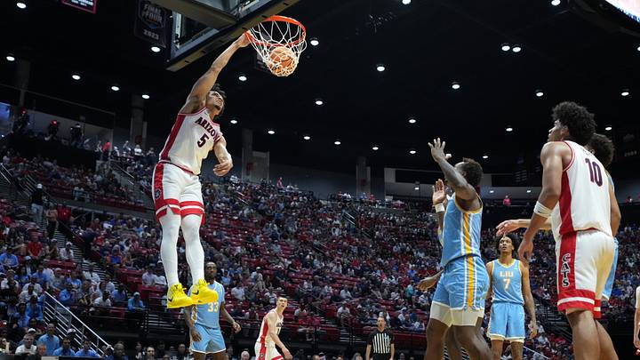 Mar 20, 2026; San Diego, CA, USA; Arizona Wildcats guard Brayden Burries (5) shoots against the LIU Sharks in the first half during a first round game of the men's 2026 NCAA Tournament at Viejas Arena. Mandatory Credit: Kirby Lee-Imagn Images Mar 20, 2026; San Diego, CA, USA; Arizona Wildcats guard Brayden Burries (5) shoots against the LIU Sharks in the first half during a first round game of the men's 2026 NCAA Tournament at Viejas Arena. Mandatory Credit: Kirby Lee-Imagn Images