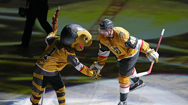 Apr 20, 2025; Las Vegas, Nevada, USA; Vegas Golden Knights center Tomas Hertl (48) celebrates with Vegas Golden Knights mascot Chance after being named Second Star of the Game as the Golden Knights defeated the Minnesota Wild 4-2 in game one of the first round of the 2025 Stanley Cup Playoffs at T-Mobile Arena. Mandatory Credit: Stephen R. Sylvanie-Imagn Images