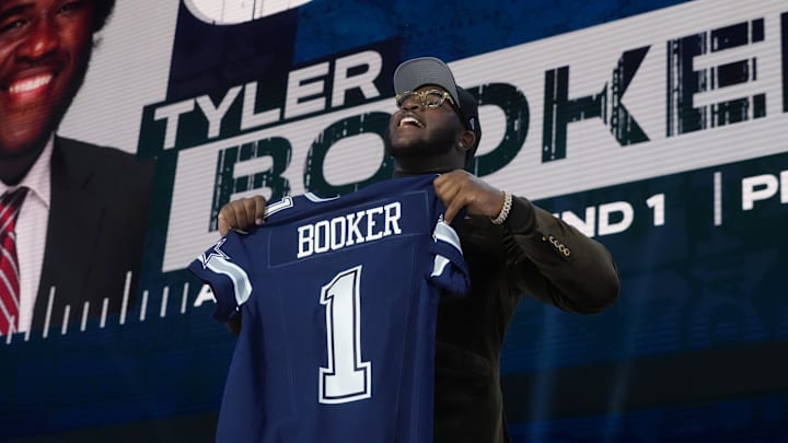 Alabama Crimson Tide offensive lineman Tyler Booker is selected by the Dallas Cowboys.