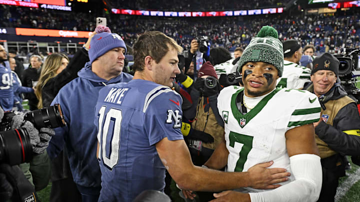 Nov 13, 2025; Foxborough, Massachusetts, USA; New England Patriots quarterback Drake Maye (10) and New York Jets quarterback Justin Fields (7) react after the game at Gillette Stadium. Mandatory Credit: Eric Canha-Imagn Images