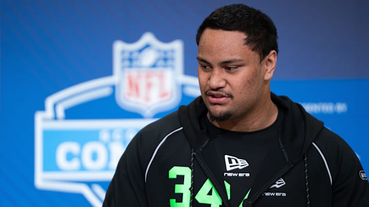 Miami offensive lineman Francis Mauigoa speaks to members of the media during the NFL Combine at the Indiana Convention Center. 