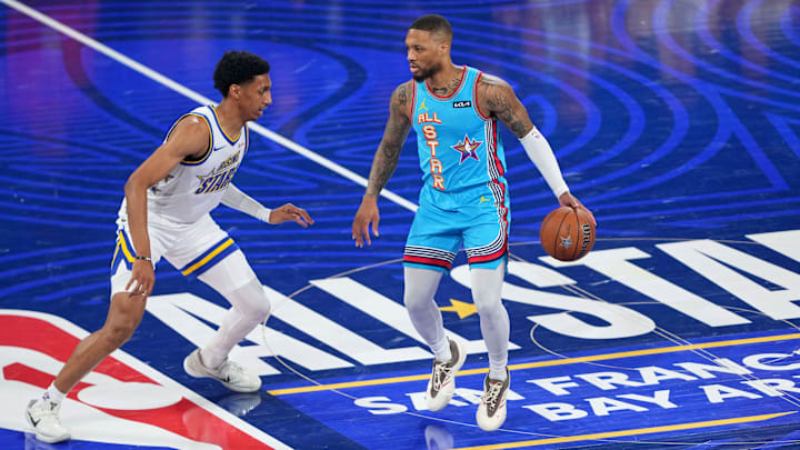 Feb 16, 2025; San Francisco, CA, USA; Shaqís OGs guard Damian Lillard (0) of the Milwaukee Bucks dribbles the ball against Candaceís Rising Stars forward Ryan Dunn (0) of the Phoenix Suns during the 2025 NBA All Star Game at Chase Center. Mandatory Credit: Darren Yamashita-Imagn Images Feb 16, 2025; San Francisco, CA, USA; Shaqís OGs guard Damian Lillard (0) of the Milwaukee Bucks dribbles the ball against Candaceís Rising Stars forward Ryan Dunn (0) of the Phoenix Suns during the 2025 NBA All Star Game at Chase Center. Mandatory Credit: Darren Yamashita-Imagn Images