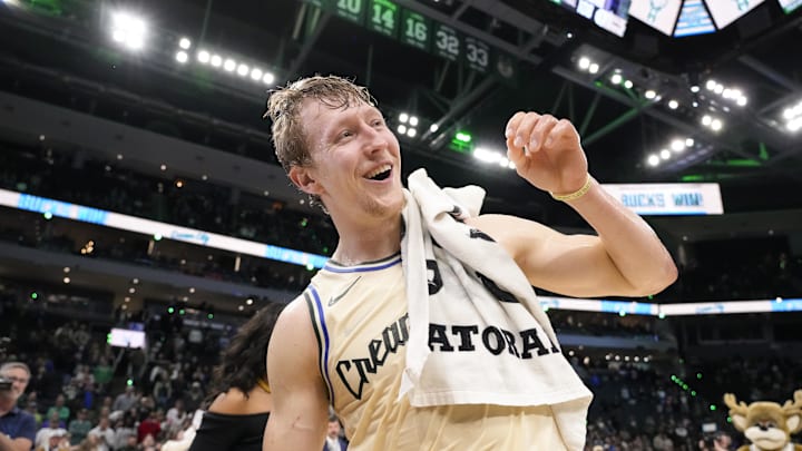 Milwaukee Bucks guard AJ Green (20) reacts after being doused with water following the game against the Brooklyn Nets at Fiserv Forum on April 10, 2026.