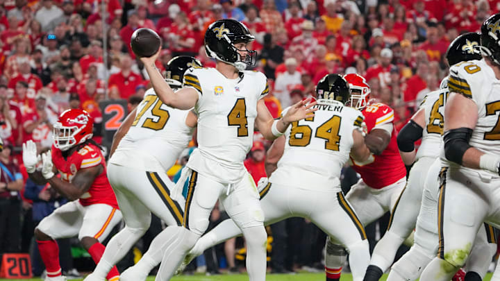 Oct 7, 2024; Kansas City, Missouri, USA; New Orleans Saints quarterback Derek Carr (4) throws a pass against the Kansas City Chiefs during the first half at GEHA Field at Arrowhead Stadium. Mandatory Credit: Denny Medley-Imagn Images Oct 7, 2024; Kansas City, Missouri, USA; New Orleans Saints quarterback Derek Carr (4) throws a pass against the Kansas City Chiefs during the first half at GEHA Field at Arrowhead Stadium. Mandatory Credit: Denny Medley-Imagn Images