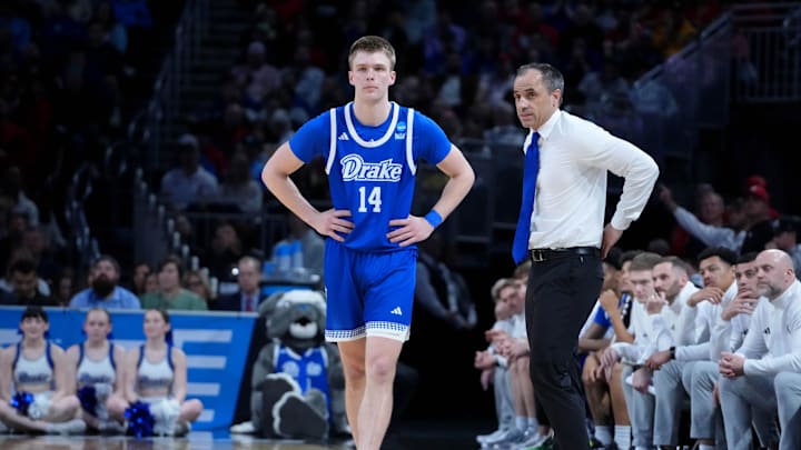 Mar 22, 2025; Wichita, KS, USA; Drake Bulldogs guard Bennett Stirtz (14) talks with head coach Ben McCollum during the second half at Intrust Bank Arena. Mandatory Credit: Kirby Lee-Imagn Images