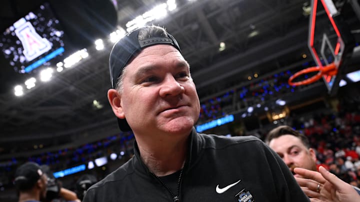 Mar 28, 2026; San Jose, CA, USA; Arizona Wildcats head coach Tommy Lloyd walks off the court after an Elite Eight game against the Purdue Boilermakers of the West Regional of the men's 2026 NCAA Tournament at SAP Center. Mandatory Credit: Eakin Howard-Imagn Images