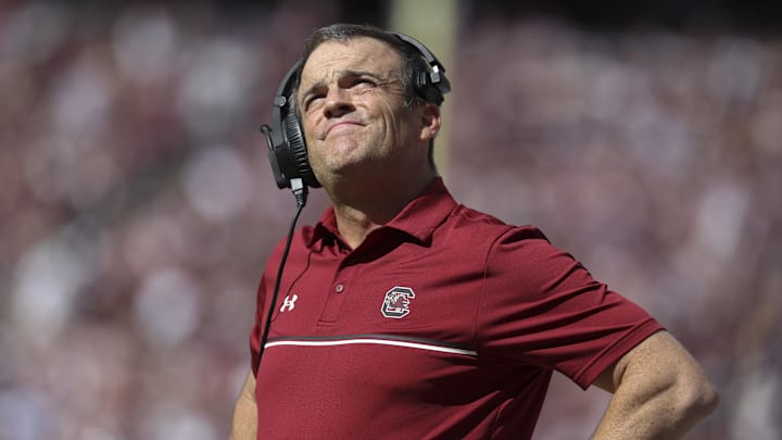 Nov 15, 2025; College Station, Texas, USA; South Carolina Gamecocks head coach Shane Beamer looks up during the second quarter against the Texas A&M Aggies at Kyle Field. Mandatory Credit: Troy Taormina-Imagn Images