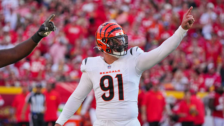 Sep 15, 2024; Kansas City, Missouri, USA; Cincinnati Bengals defensive end Trey Hendrickson (91) celebrates against the Kansas City Chiefs after a play during the game at GEHA Field at Arrowhead Stadium.  