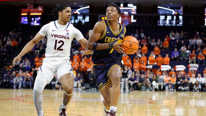 Jan 7, 2026; Charlottesville, Virginia, USA; Virginia Cavaliers guard Elijah Gertrude (12) defends as California Golden Bears guard Dai Dai Ames (7) dribbles during the first half at John Paul Jones Arena. Mandatory Credit: Amber Searls-Imagn Images Jan 7, 2026; Charlottesville, Virginia, USA; Virginia Cavaliers guard Elijah Gertrude (12) defends as California Golden Bears guard Dai Dai Ames (7) dribbles during the first half at John Paul Jones Arena. Mandatory Credit: Amber Searls-Imagn Images