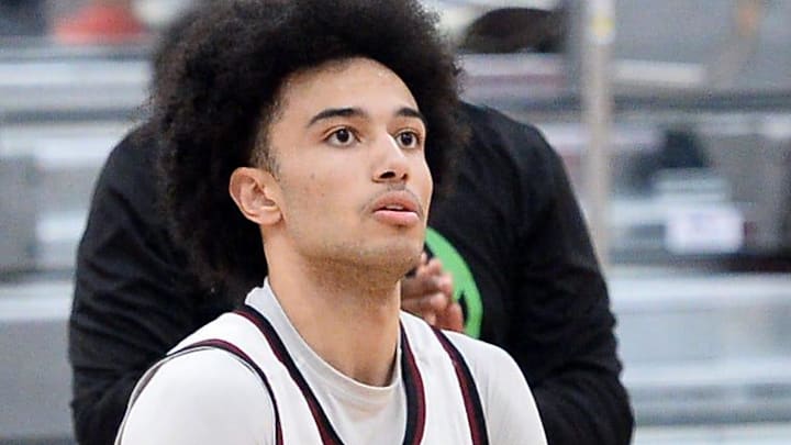 Jayden Yates eyes up a 3-point shot against Georgetown Day.