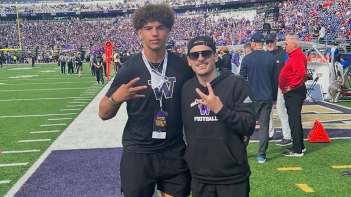Troy Bowens and Aaron Van Horn share a UW recruiting moment.