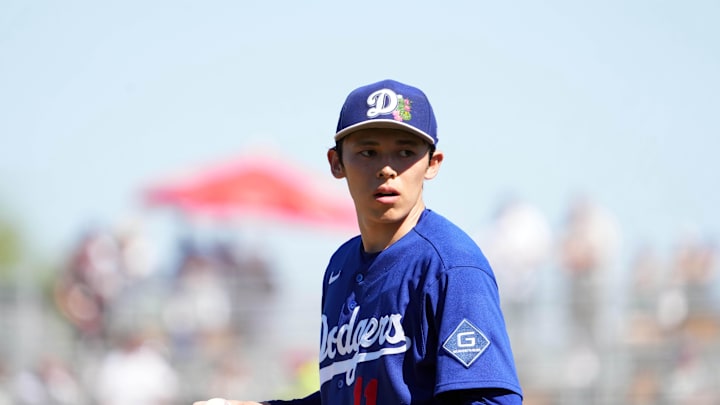 Mar 3, 2026; Goodyear, Arizona, USA; Los Angeles Dodgers starting pitcher Roki Sasaki (11) pitches against the Cleveland Guardians during the third inning at Goodyear Ballpark. Mandatory Credit: Joe Camporeale-Imagn Images