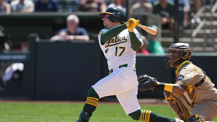 Apr 9, 2025; West Sacramento, California, USA; Athletics third baseman Luis Urias (17) hits an RBI sacrifice fly against the San Diego Padres during the second inning at Sutter Health Park. Mandatory Credit: Darren Yamashita-Imagn Images Apr 9, 2025; West Sacramento, California, USA; Athletics third baseman Luis Urias (17) hits an RBI sacrifice fly against the San Diego Padres during the second inning at Sutter Health Park. Mandatory Credit: Darren Yamashita-Imagn Images