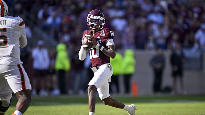 Dec 20, 2025; College Station, TX, USA; Texas A&M Aggies quarterback Marcel Reed (10) looks to throw the ball during the game between the Aggies and the Hurricanes at Kyle Field. Mandatory Credit: Jerome Miron-Imagn Images Dec 20, 2025; College Station, TX, USA; Texas A&M Aggies quarterback Marcel Reed (10) looks to throw the ball during the game between the Aggies and the Hurricanes at Kyle Field. Mandatory Credit: Jerome Miron-Imagn Images