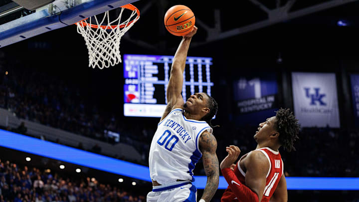 Feb 1, 2025; Lexington, Kentucky, USA; Kentucky Wildcats guard Otega Oweh (00) dunks the ball during the second half against the Arkansas Razorbacks at Rupp Arena at Central Bank Center. Mandatory Credit: Jordan Prather-Imagn Images