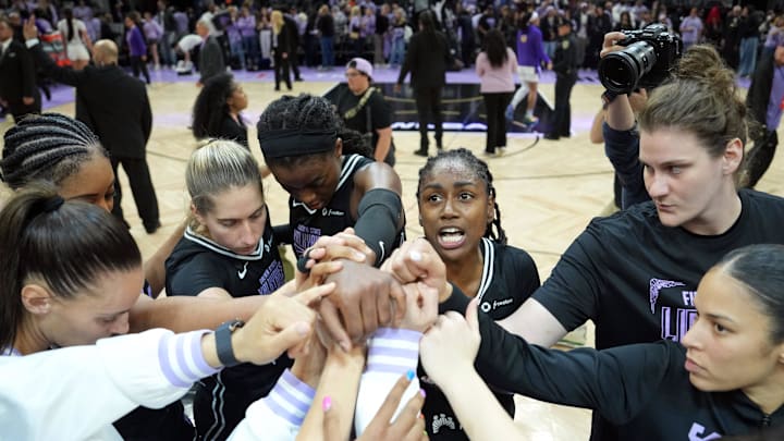 Golden State Valkyries players huddle on the court after the game against the Los Angeles Sparks at Chase Center.