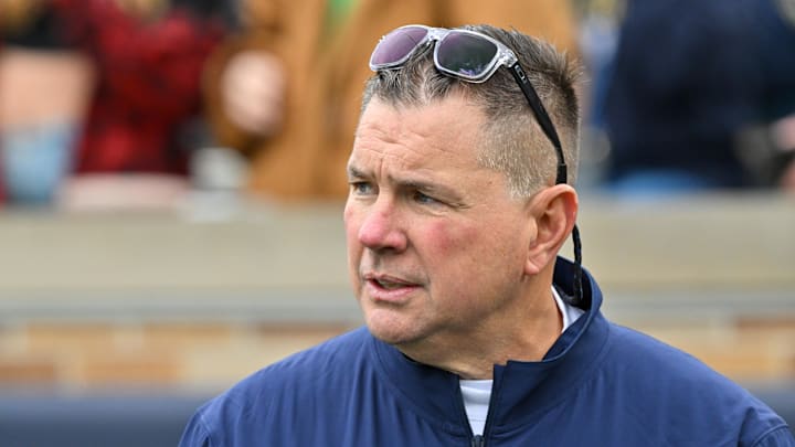 Nov 16, 2024; South Bend, Indiana, USA; Notre Dame Fighting Irish defensive coordinator Al Golden watches warmups before a game against the Virginia Cavaliers at Notre Dame Stadium. Mandatory Credit: Matt Cashore-Imagn Images Nov 16, 2024; South Bend, Indiana, USA; Notre Dame Fighting Irish defensive coordinator Al Golden watches warmups before a game against the Virginia Cavaliers at Notre Dame Stadium. Mandatory Credit: Matt Cashore-Imagn Images