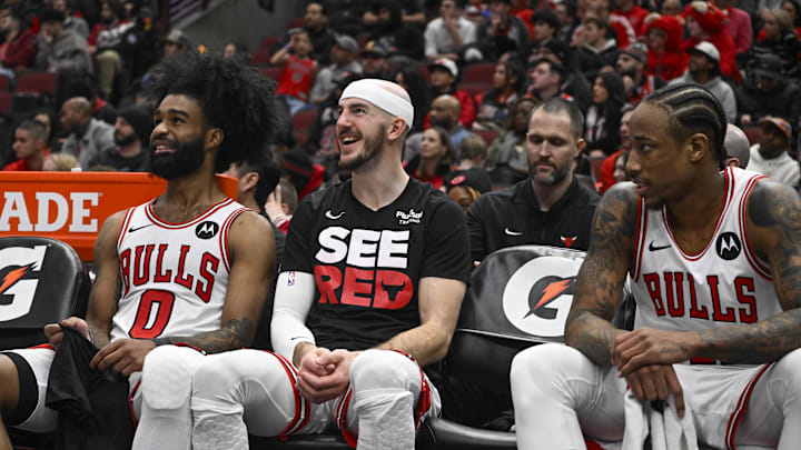 Jan 20, 2024; Chicago, Illinois, USA;  Chicago Bulls guard Coby White (0), guard Alex Caruso (6) and forward DeMar DeRozan (11) laugh on the bench against the Memphis Grizzlies during the second half at the United Center. Mandatory Credit: Matt Marton-USA TODAY Sports