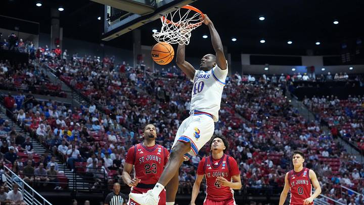 Mar 22, 2026; San Diego, CA, USA; Kansas Jayhawks forward Flory Bidunga (40) dunks against the St. John's Red Storm in the second half during a second round game of the men's 2026 NCAA Tournament at Viejas Arena. Mandatory Credit: Kirby Lee-Imagn Images