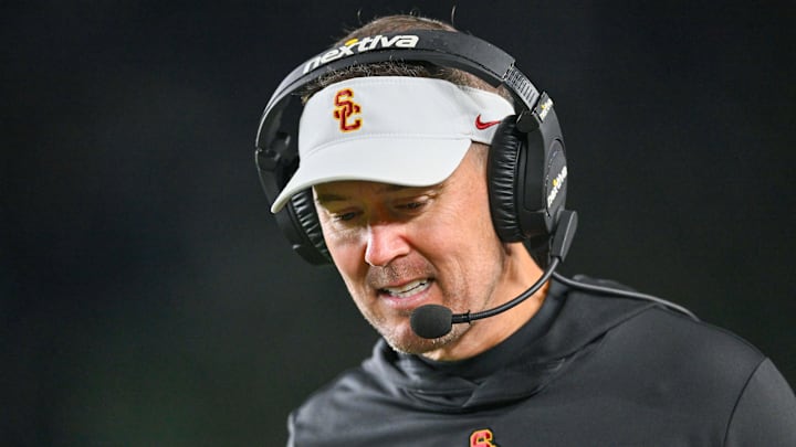 Oct 14, 2023; South Bend, Indiana, USA; USC Trojans head coach Lincoln Riley talks on his headset in the third quarter against the Notre Dame Fighting Irish at Notre Dame Stadium. 