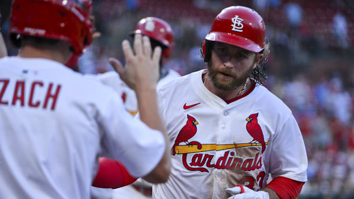 Jul 24, 2025; St. Louis, Missouri, USA;  St. Louis Cardinals second baseman Brendan Donovan (33) is congratulated by teammates after hitting a three run home run against the San Diego Padres during the second inning at Busch Stadium. Mandatory Credit: Jeff Curry-Imagn Images