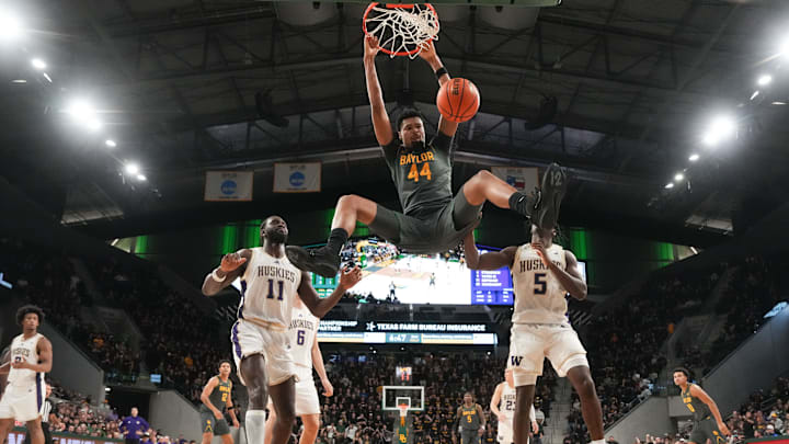 Baylor Bears center Caden Powell (44) dunks the ball against the Washington Huskies during the second half at Paul and Alejandra Foster Pavilion Baylor Bears center Caden Powell (44) dunks the ball against the Washington Huskies during the second half at Paul and Alejandra Foster Pavilion