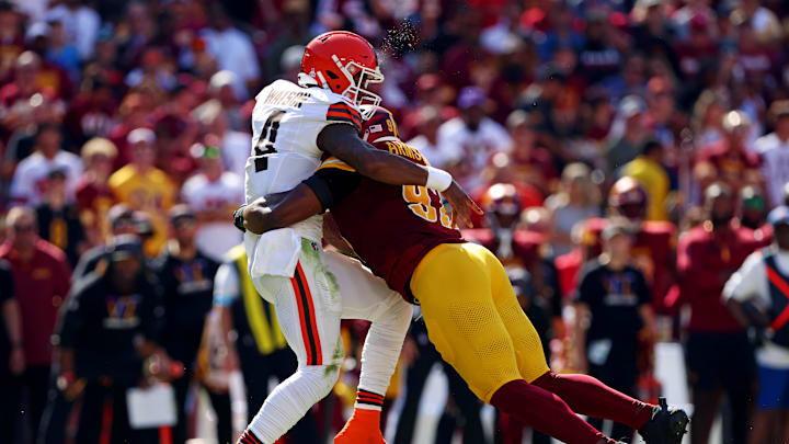 Oct 6, 2024; Landover, Maryland, USA; Cleveland Browns quarterback Deshaun Watson (4) is hit by Washington Commanders defensive end Dorance Armstrong (92) while throwing the ball during the second quarter at NorthWest Stadium. Mandatory Credit: Peter Casey-Imagn Images Oct 6, 2024; Landover, Maryland, USA; Cleveland Browns quarterback Deshaun Watson (4) is hit by Washington Commanders defensive end Dorance Armstrong (92) while throwing the ball during the second quarter at NorthWest Stadium. Mandatory Credit: Peter Casey-Imagn Images